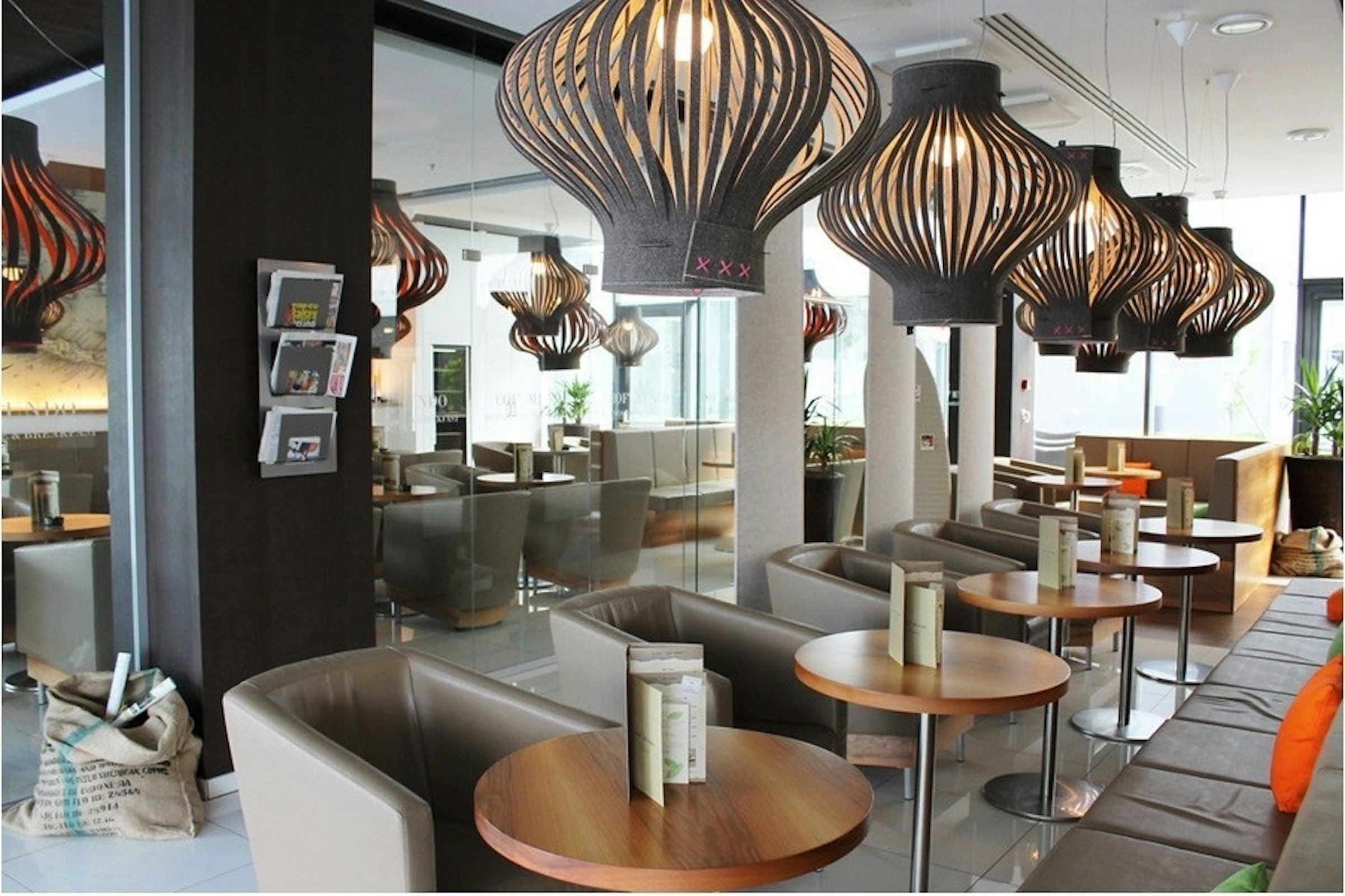 BuzziLight Mono suspended above restaurant tables
